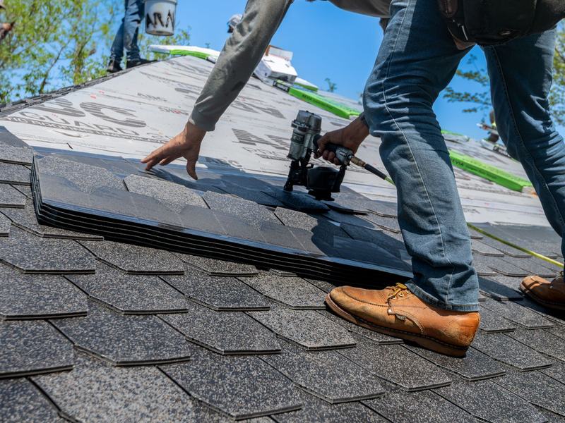 Roofing work on a home near Waverly, Iowa
