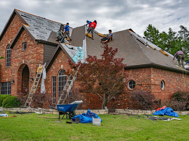 Roofing work on a home near Evansdale, Iowa